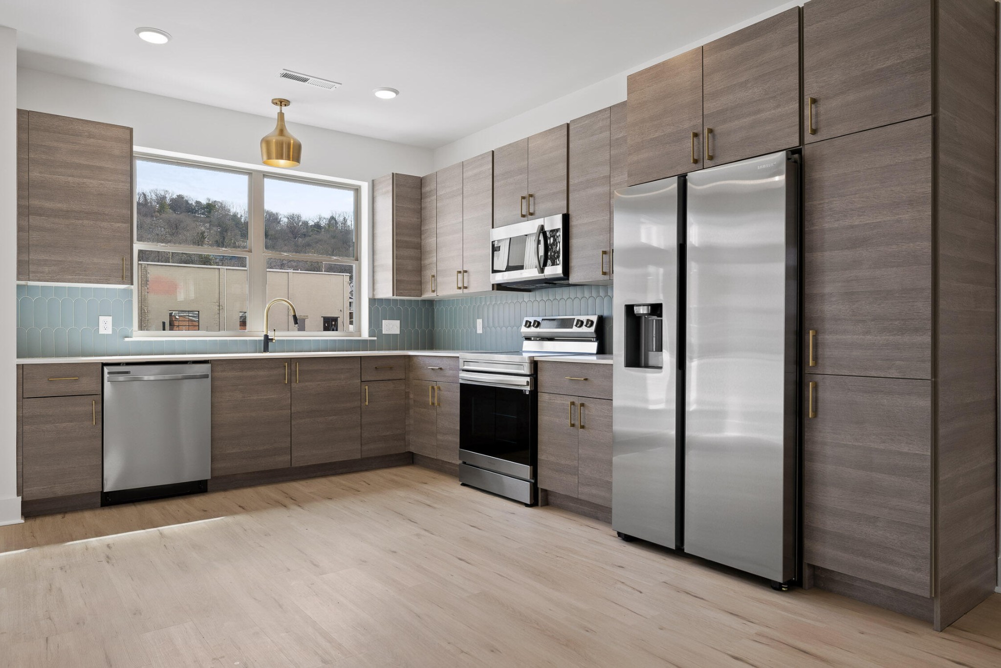 1847 Coosa Way Chattanooga, TN 37404 - Photo 10 of 52 a kitchen with a refrigerator sink and cabinets