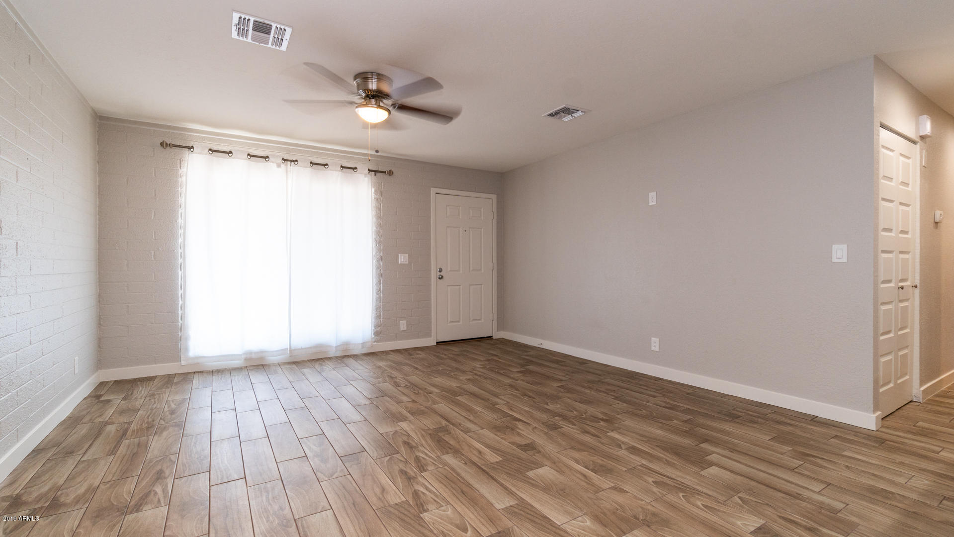 1628 West Maldonado Road Phoenix, AZ 85041 - Photo 3 of 21 Family Room2