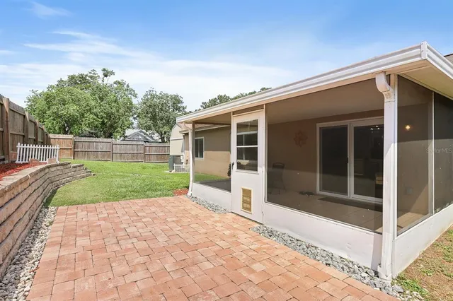a view of a backyard with a garden and plants