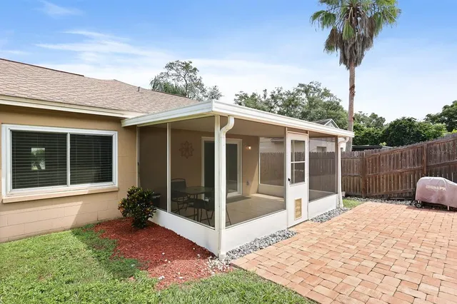 a view of a backyard with a garden and plants