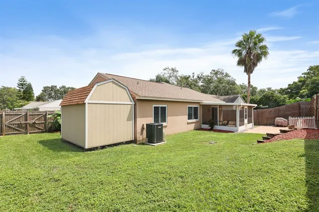 a house view with a sitting space and garden