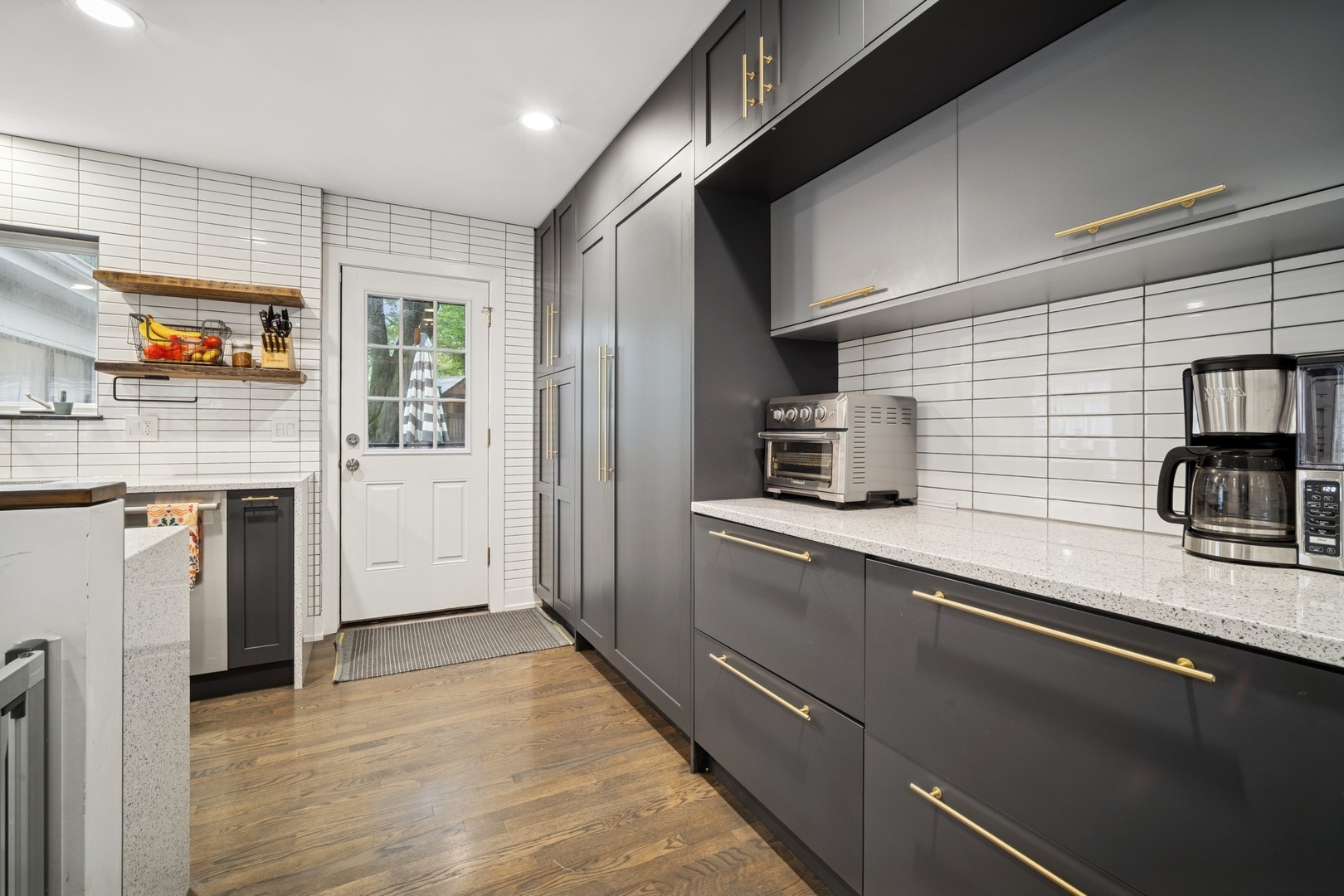 505 Pine Court Lake Bluff, IL 60044 - Photo 13 of 29 a kitchen with stainless steel appliances granite countertop a sink a stove and a refrigerator