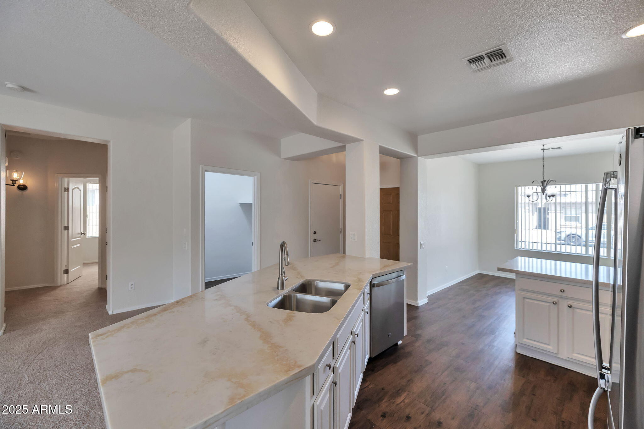 9135 West Monte Vista Road Phoenix, AZ 85037 - Photo 5 of 26 8-web-or-mls-QPT Photo - MAP_7338
