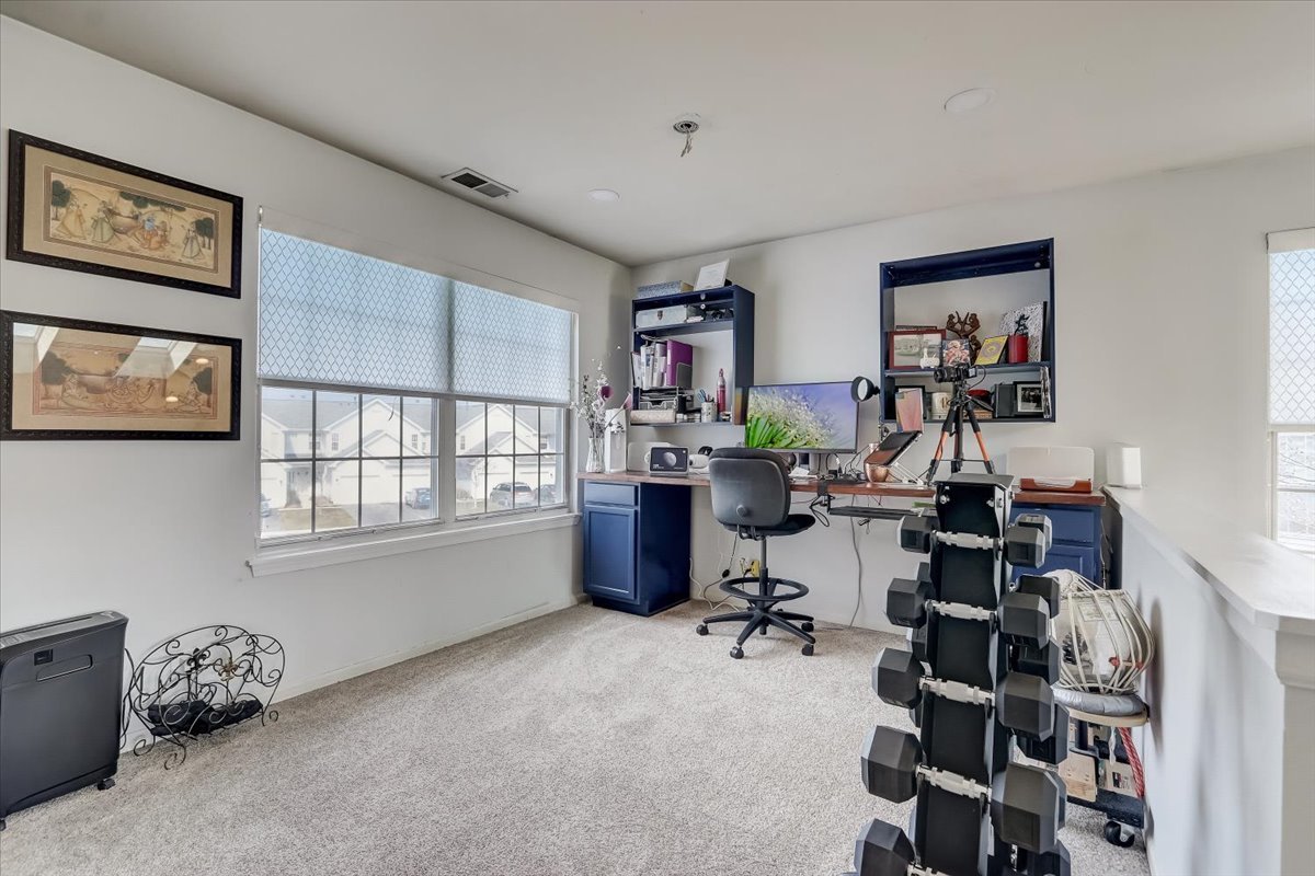 17885 Braewick Road, Unit 17217 Gurnee, IL 60031 - Photo 18 of 35 a room with furniture and a window