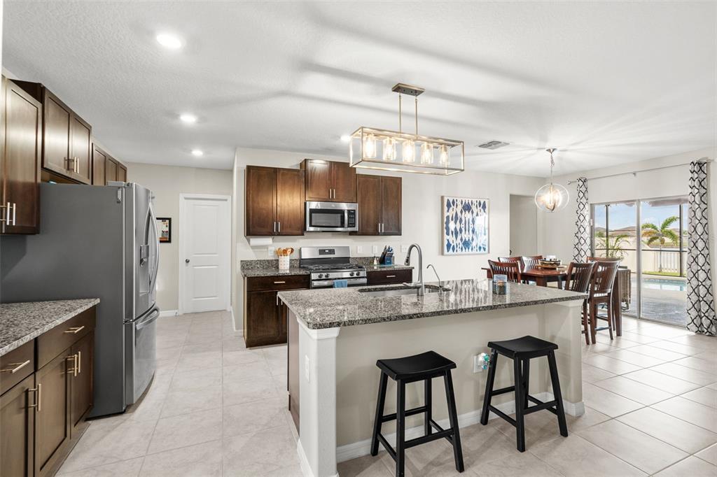 9823 Lemon Drop Loop Ruskin, FL 33573 - Photo 7 of 56 Gallery Image 7