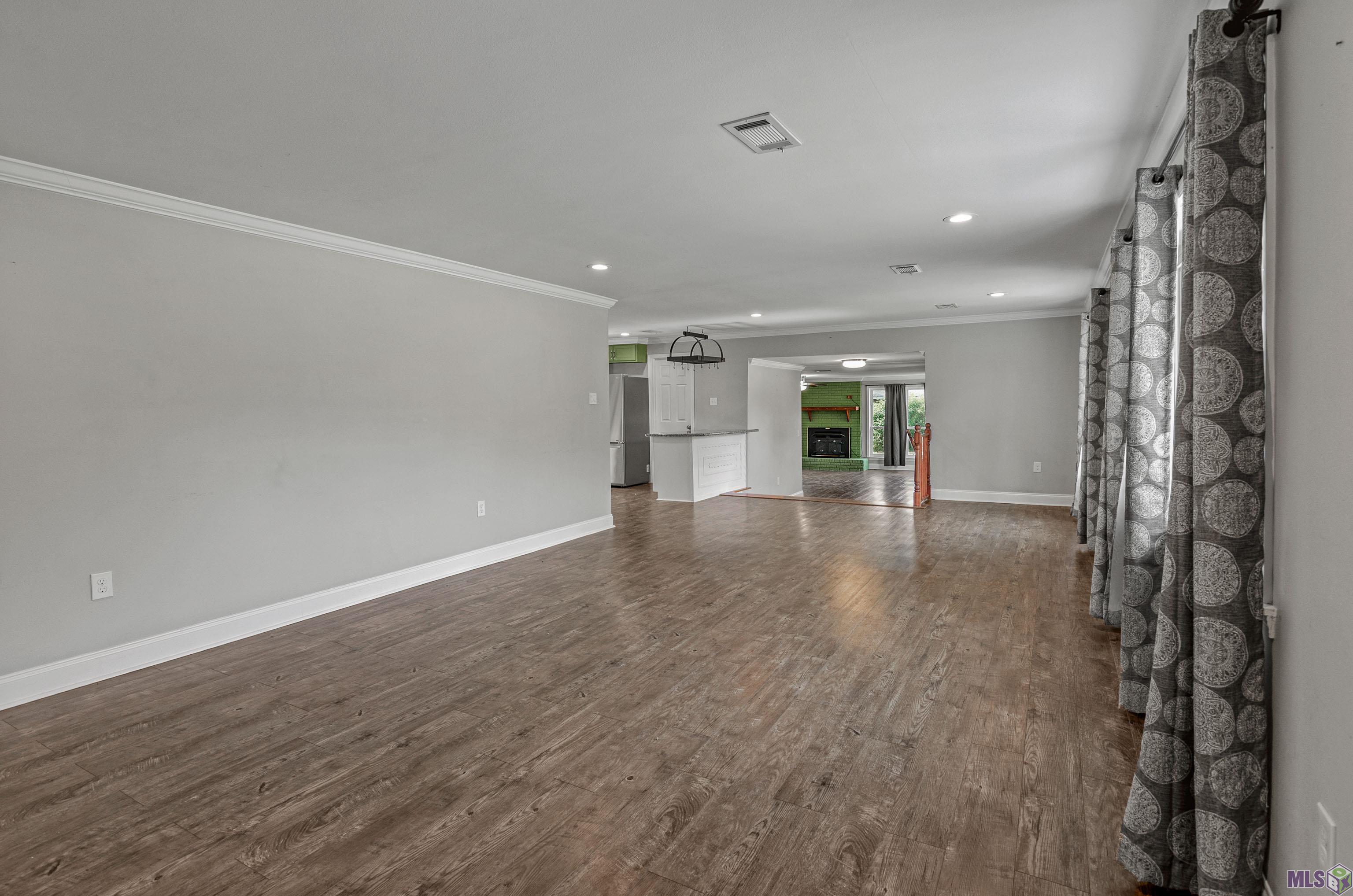 11274 Arnold Road Denham Springs, LA 70726 - Photo 6 of 24 Living/Dining Area