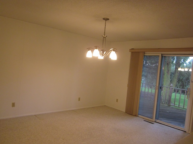 208 Linder Lane Rochelle, IL 61068 - Photo 12 of 25 a view of a room with windows outdoor and chandelier
