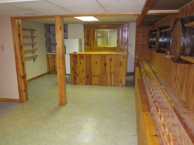 208 Linder Lane Rochelle, IL 61068 - Photo 18 of 25 a view of a hallway with wooden cabinets