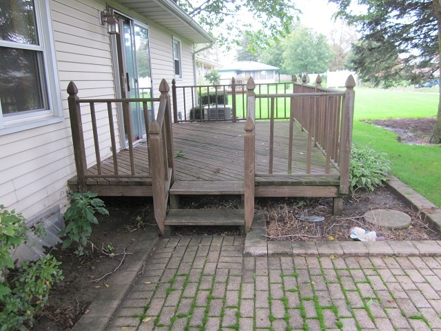 208 Linder Lane Rochelle, IL 61068 - Photo 23 of 25 a view of a wooden fence with a bench