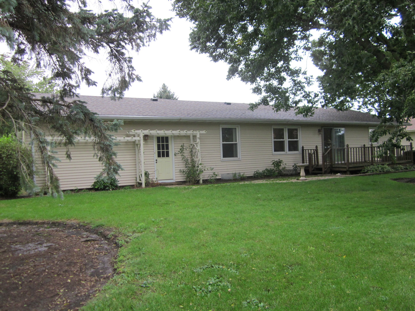 208 Linder Lane Rochelle, IL 61068 - Photo 25 of 25 a front view of house with yard and green space