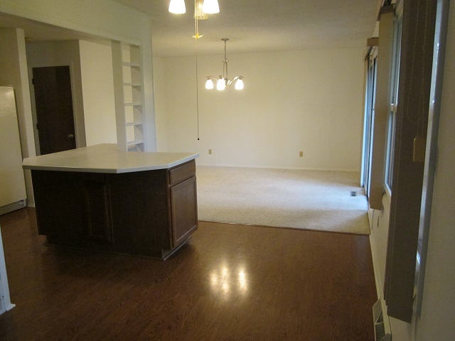208 Linder Lane Rochelle, IL 61068 - Photo 9 of 25 a view of a room with a chandelier