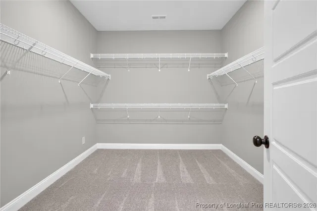 a view of a room with racks on the wall