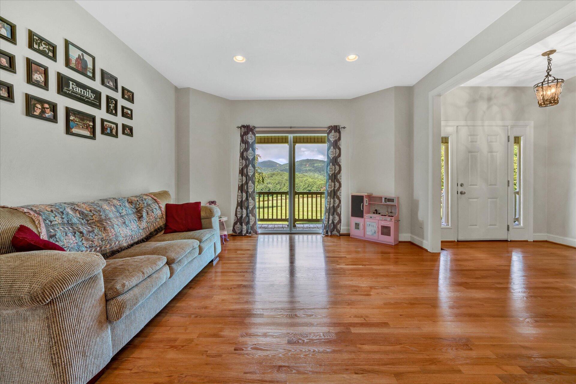 325 Rock Ridge Road Callaway, VA 24067 - Photo 11 of 74 a living room with furniture and a large window