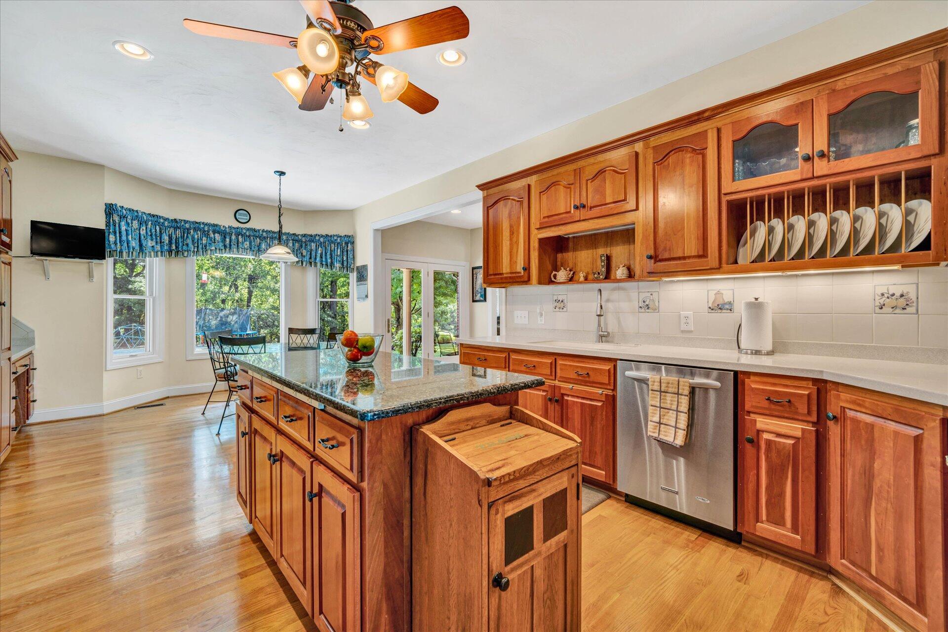 325 Rock Ridge Road Callaway, VA 24067 - Photo 15 of 74 a kitchen with stainless steel appliances granite countertop a stove and a sink