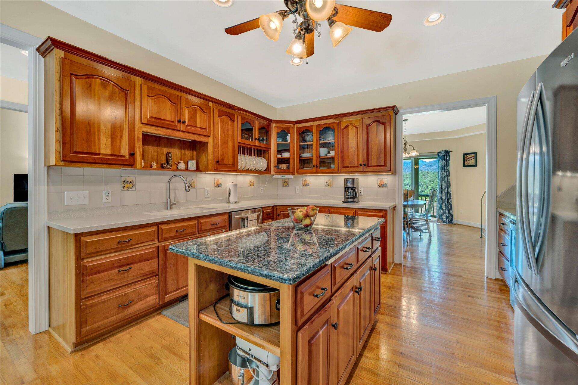 325 Rock Ridge Road Callaway, VA 24067 - Photo 18 of 74 a kitchen with stainless steel appliances granite countertop a sink and cabinets