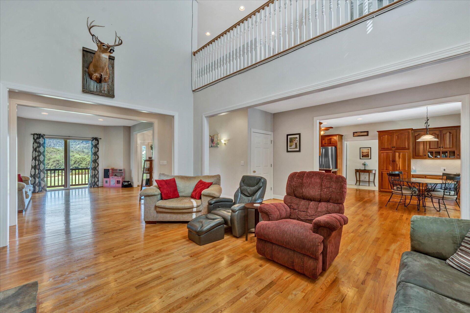 325 Rock Ridge Road Callaway, VA 24067 - Photo 25 of 74 a living room with furniture and wooden floor