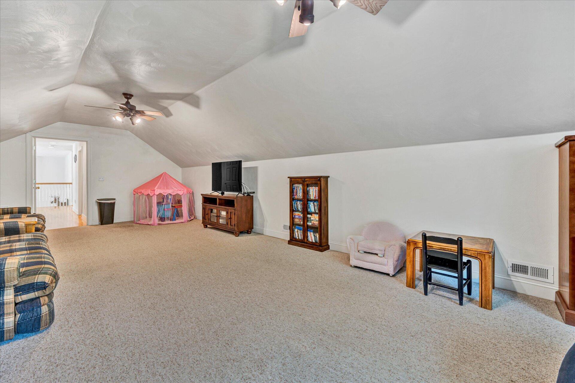 325 Rock Ridge Road Callaway, VA 24067 - Photo 43 of 74 a living room with furniture and a ceiling fan