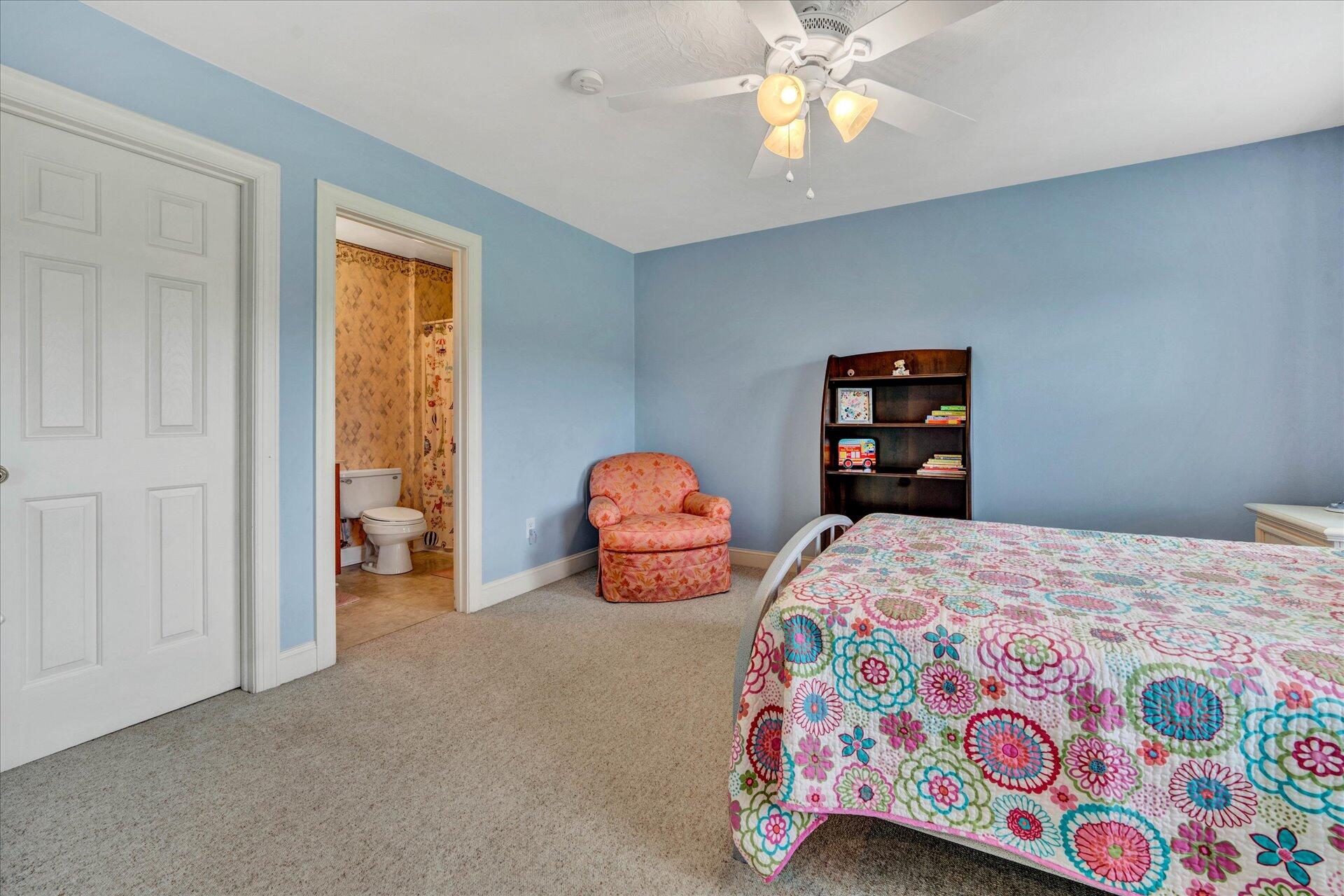 325 Rock Ridge Road Callaway, VA 24067 - Photo 48 of 74 a bedroom with a bed and window