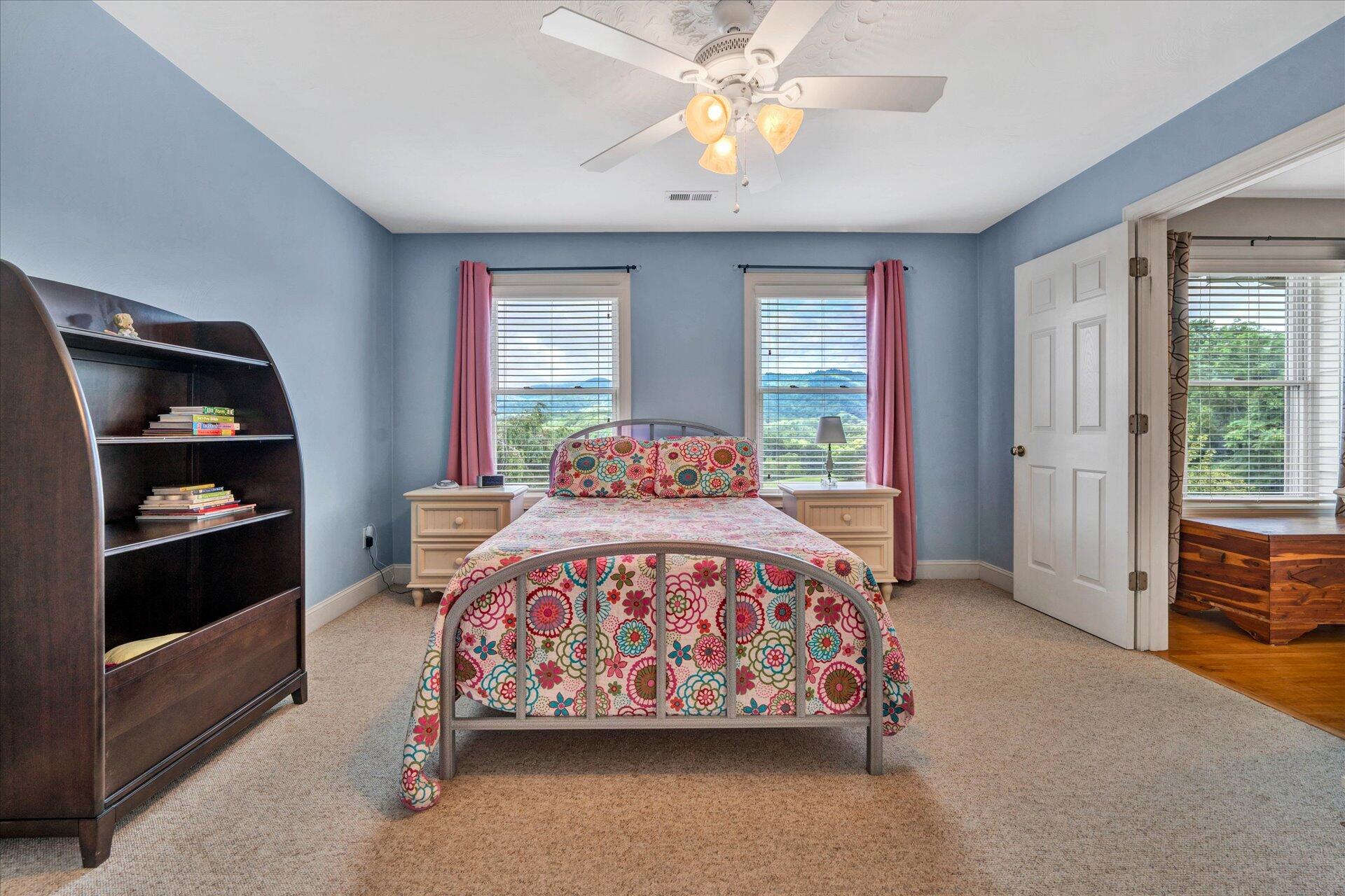 325 Rock Ridge Road Callaway, VA 24067 - Photo 49 of 74 a bedroom with a bed and a window