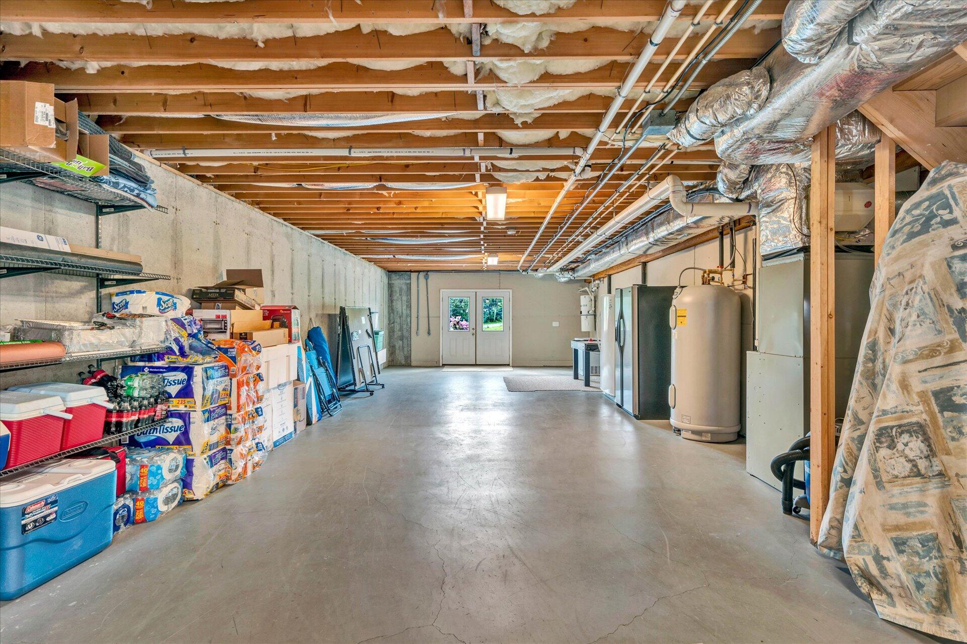 325 Rock Ridge Road Callaway, VA 24067 - Photo 52 of 74 a view of a storage room with a lot of stuff