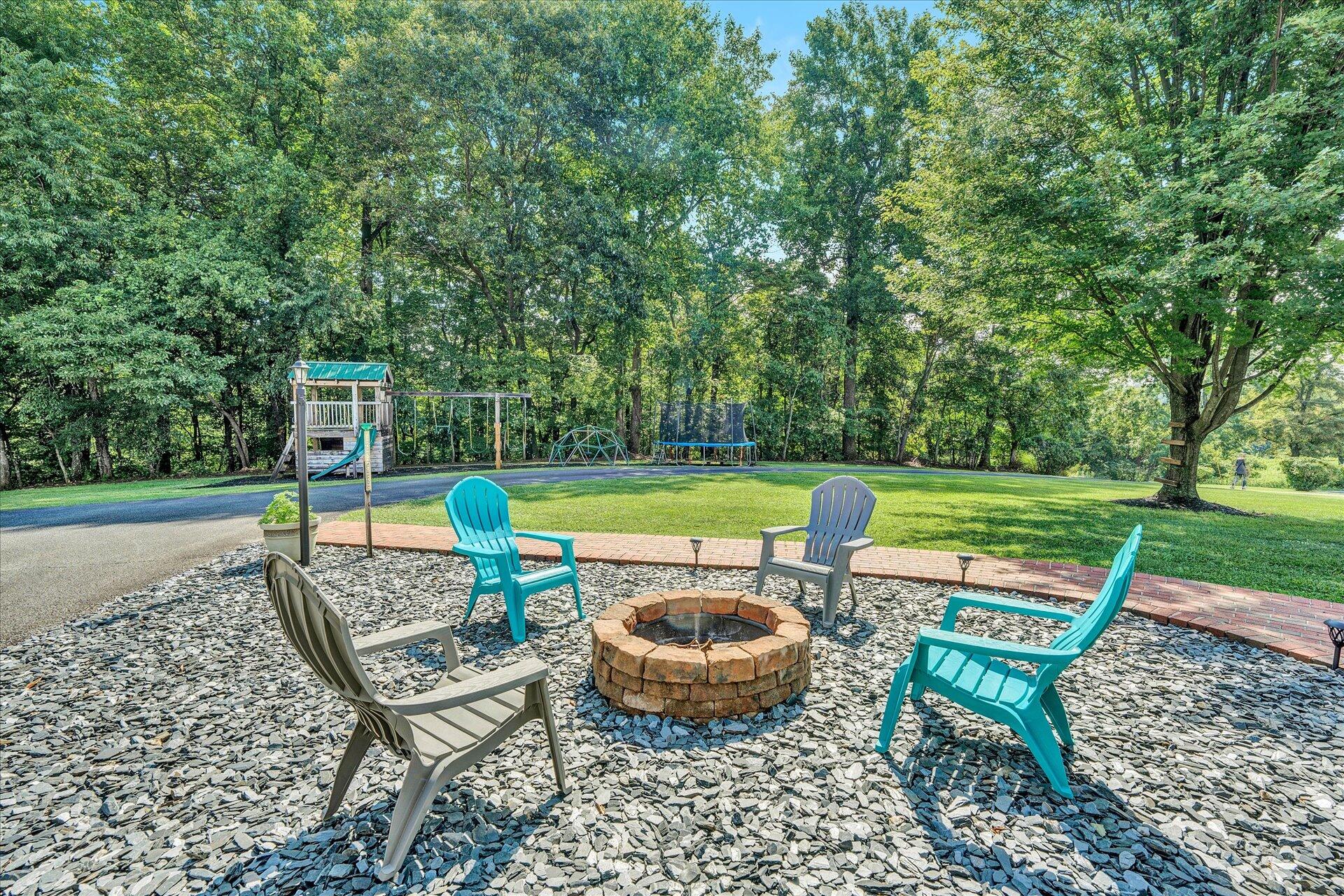 325 Rock Ridge Road Callaway, VA 24067 - Photo 56 of 74 a view of a chairs and table in the garden