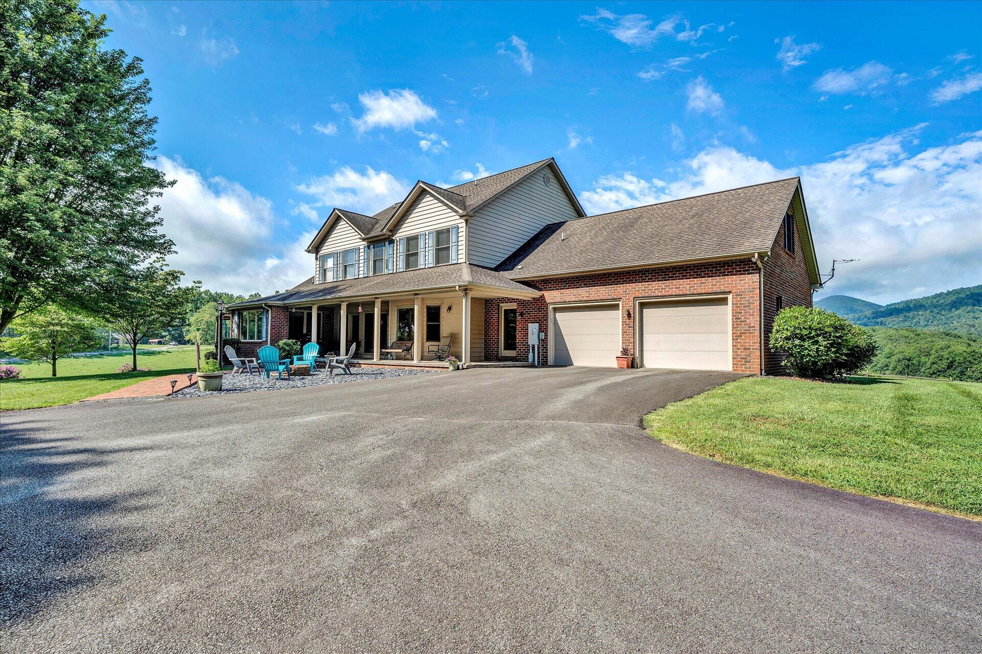325 Rock Ridge Road Callaway, VA 24067 - Photo 60 of 74 a front view of a house with a yard