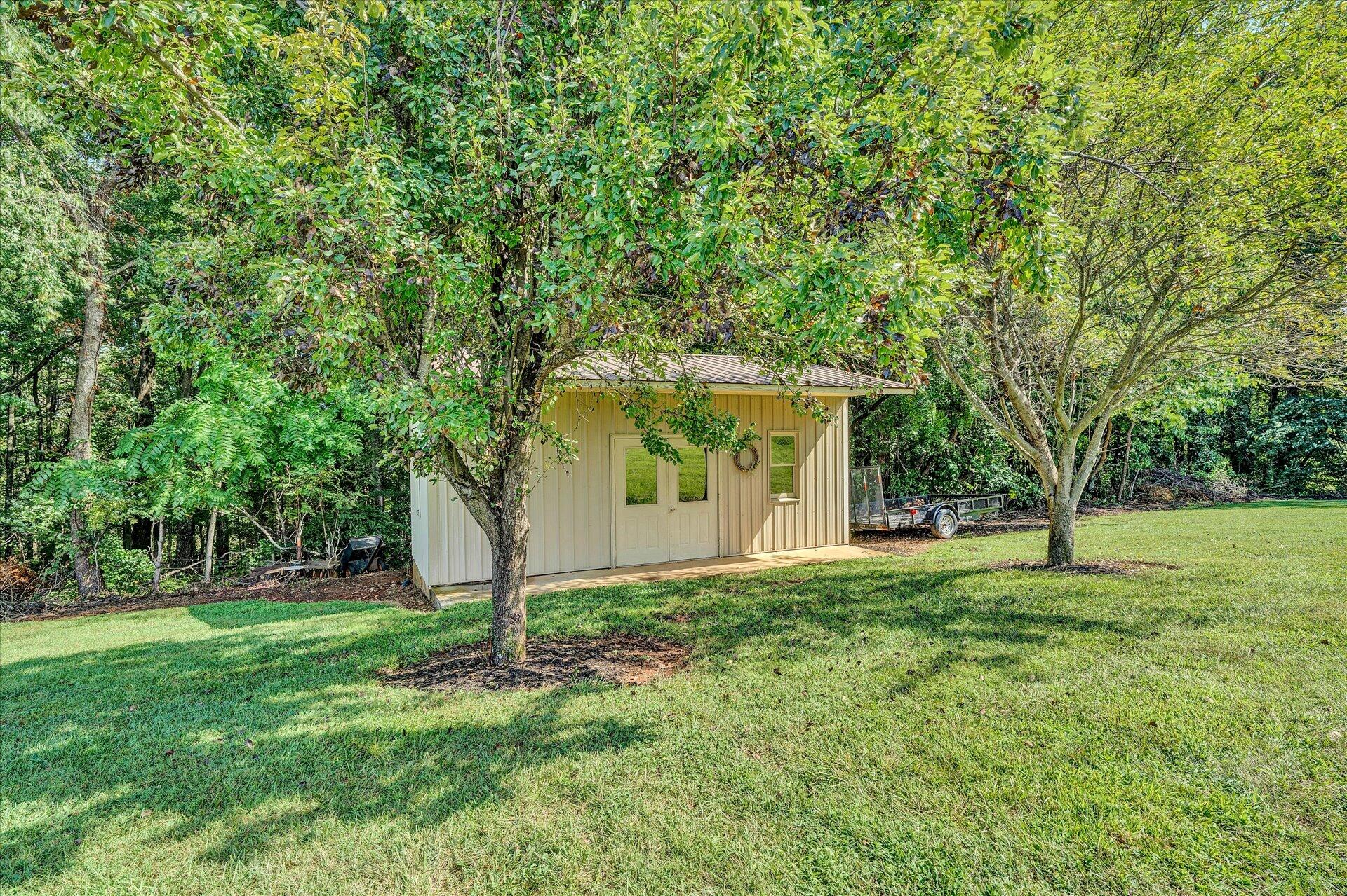 325 Rock Ridge Road Callaway, VA 24067 - Photo 61 of 74 a view of a house with a yard