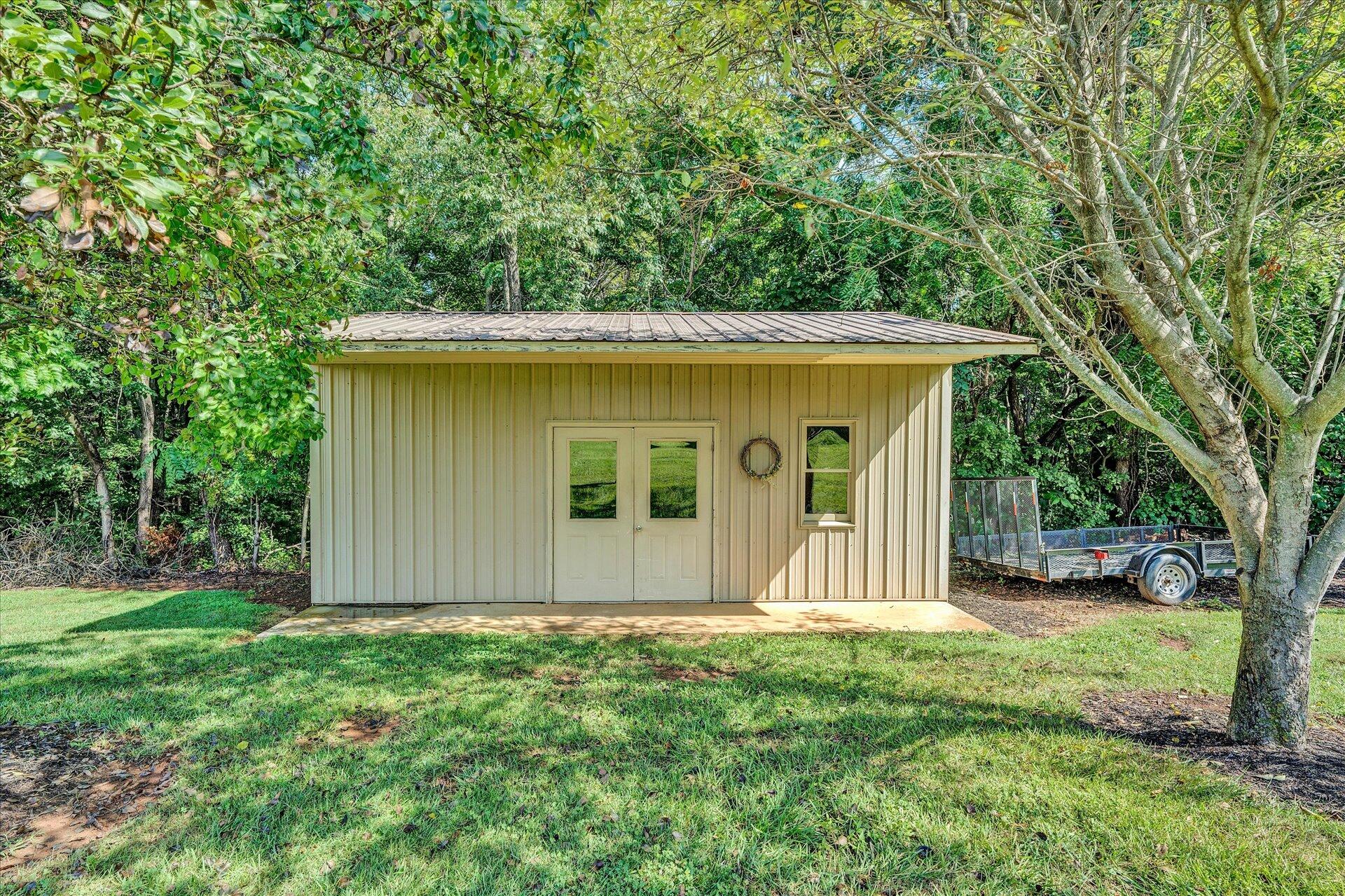 325 Rock Ridge Road Callaway, VA 24067 - Photo 62 of 74 a front view of a house with garden