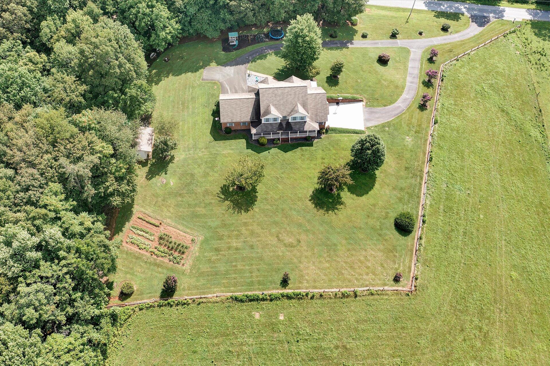 325 Rock Ridge Road Callaway, VA 24067 - Photo 72 of 74 an aerial view of a house with pool yard swimming pool and outdoor seating