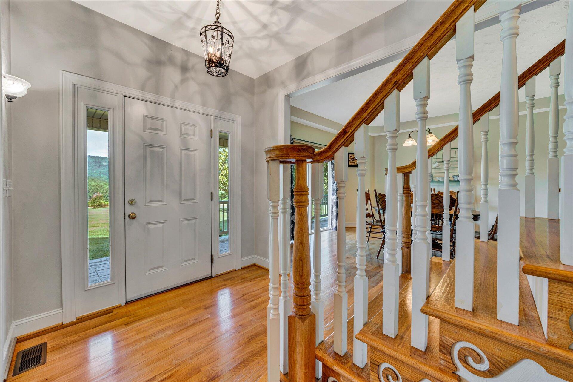 325 Rock Ridge Road Callaway, VA 24067 - Photo 10 of 74 a view of an entryway with wooden floor and door