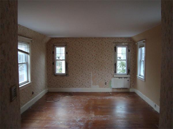 136 North Main Street Sharon, MA 02067 - Photo 14 of 18 an empty room with wooden floor and windows
