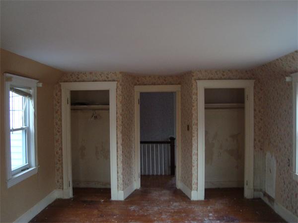 136 North Main Street Sharon, MA 02067 - Photo 17 of 18 an empty room with windows and closet