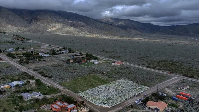 a view of yard with outdoor seating