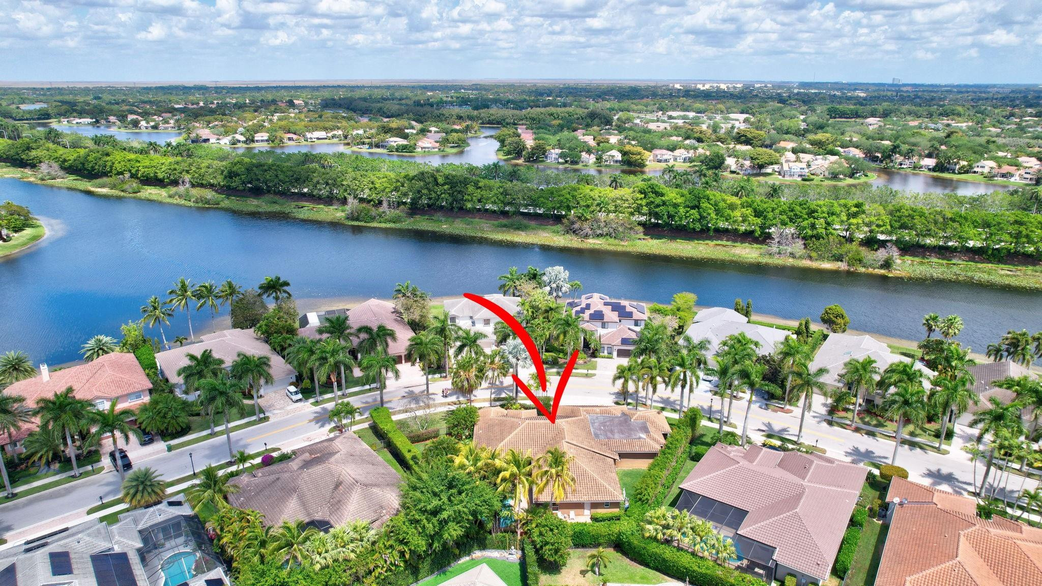 2529 Eagle Run Circle Fort Lauderdale, FL 33327 - Photo 13 of 74 an aerial view of lake and residential houses with outdoor space