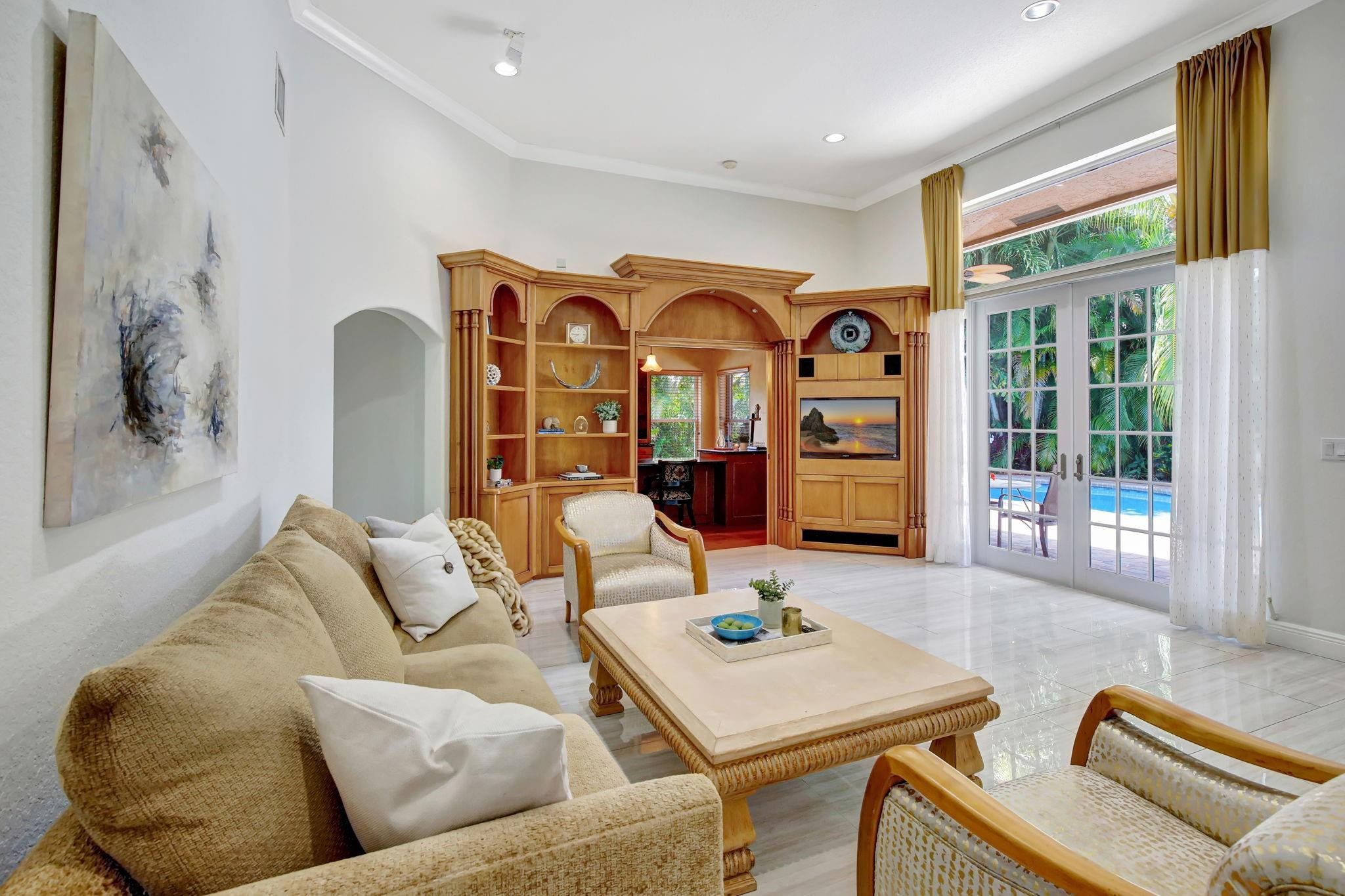2529 Eagle Run Circle Fort Lauderdale, FL 33327 - Photo 24 of 74 a living room with furniture and a large window