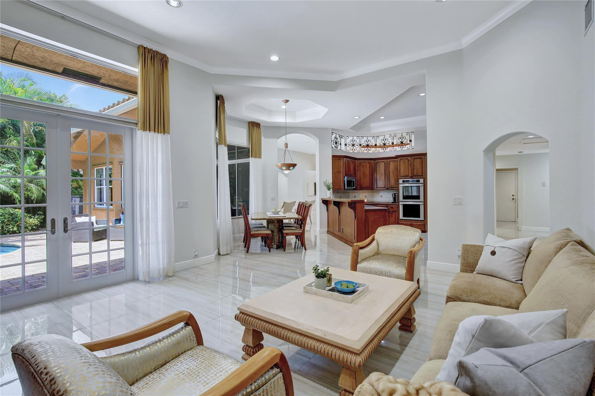 2529 Eagle Run Circle Fort Lauderdale, FL 33327 - Photo 25 of 74 a living room with furniture and a table