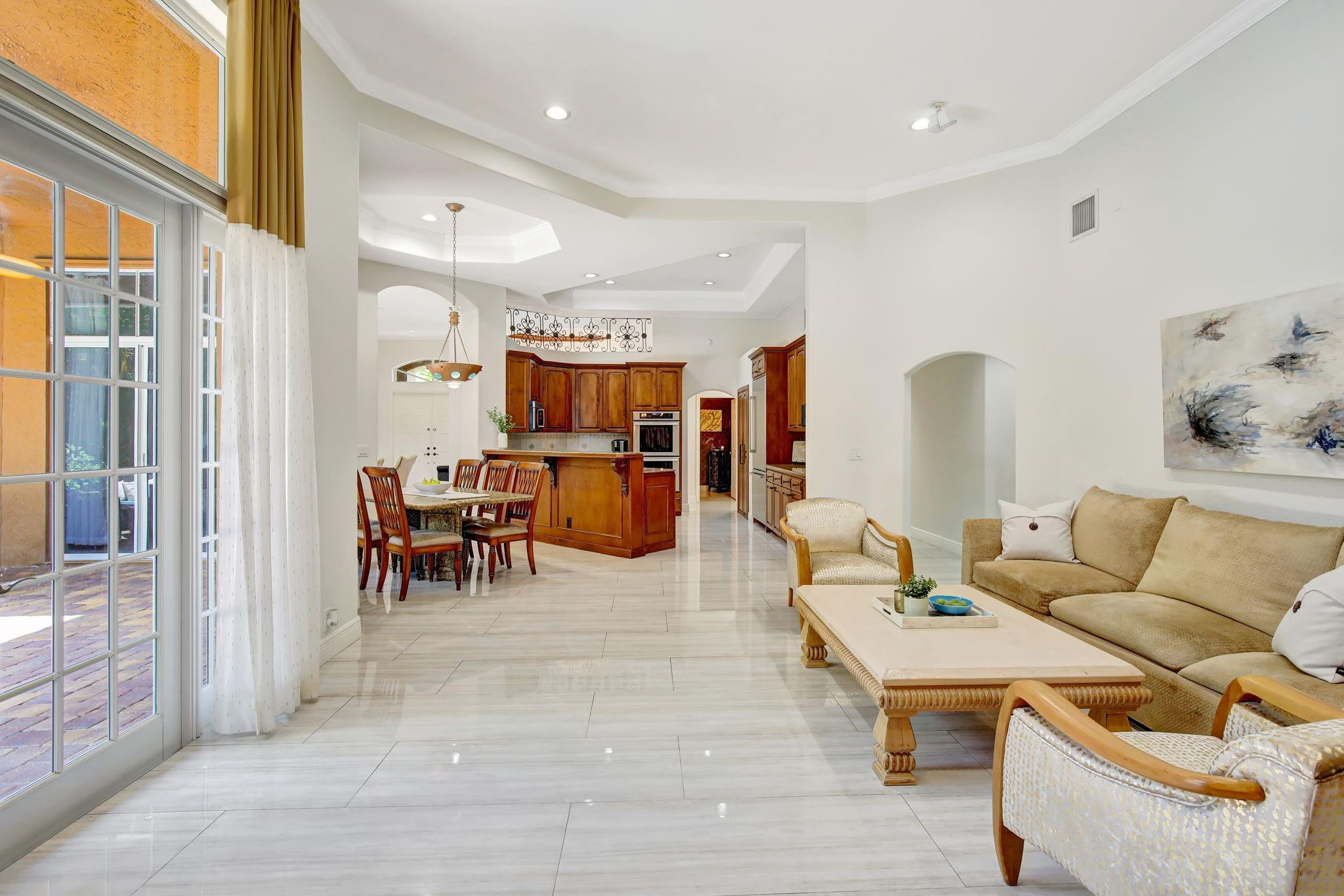 2529 Eagle Run Circle Fort Lauderdale, FL 33327 - Photo 26 of 74 a living room with furniture and a large window
