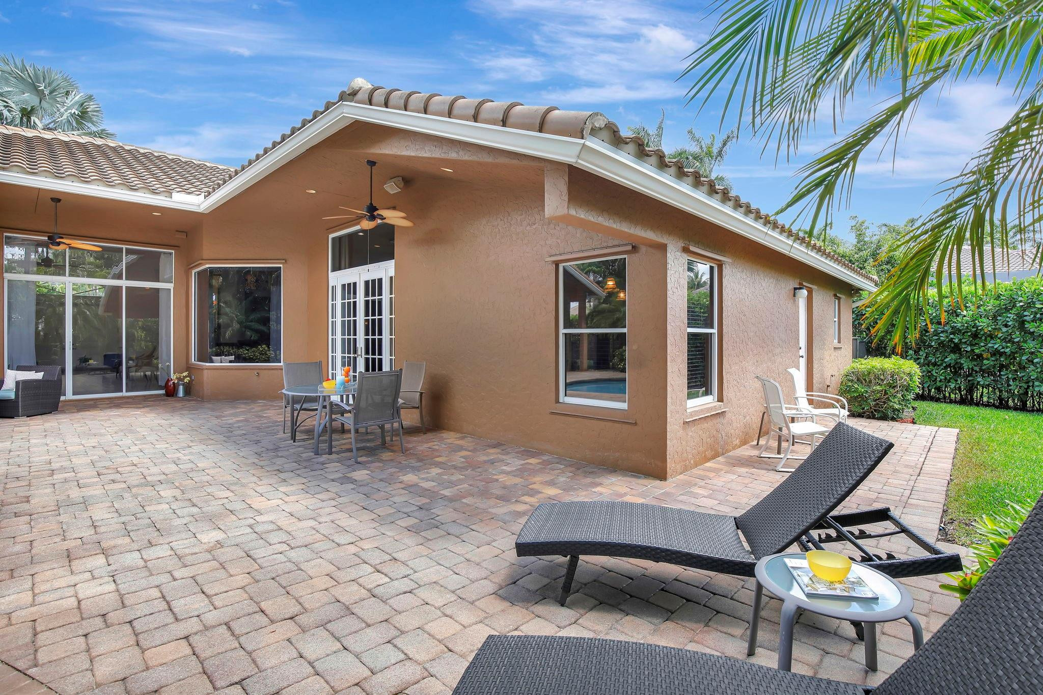 2529 Eagle Run Circle Fort Lauderdale, FL 33327 - Photo 29 of 74 a backyard of a house with seating space