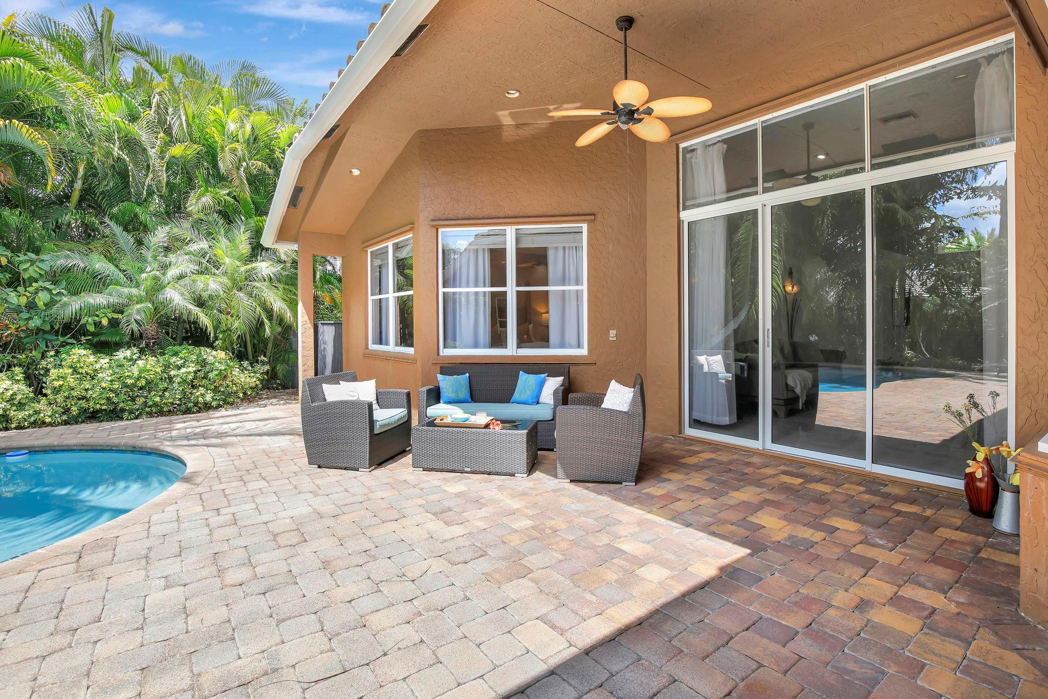 2529 Eagle Run Circle Fort Lauderdale, FL 33327 - Photo 32 of 74 a view of a house with backyard and sitting area