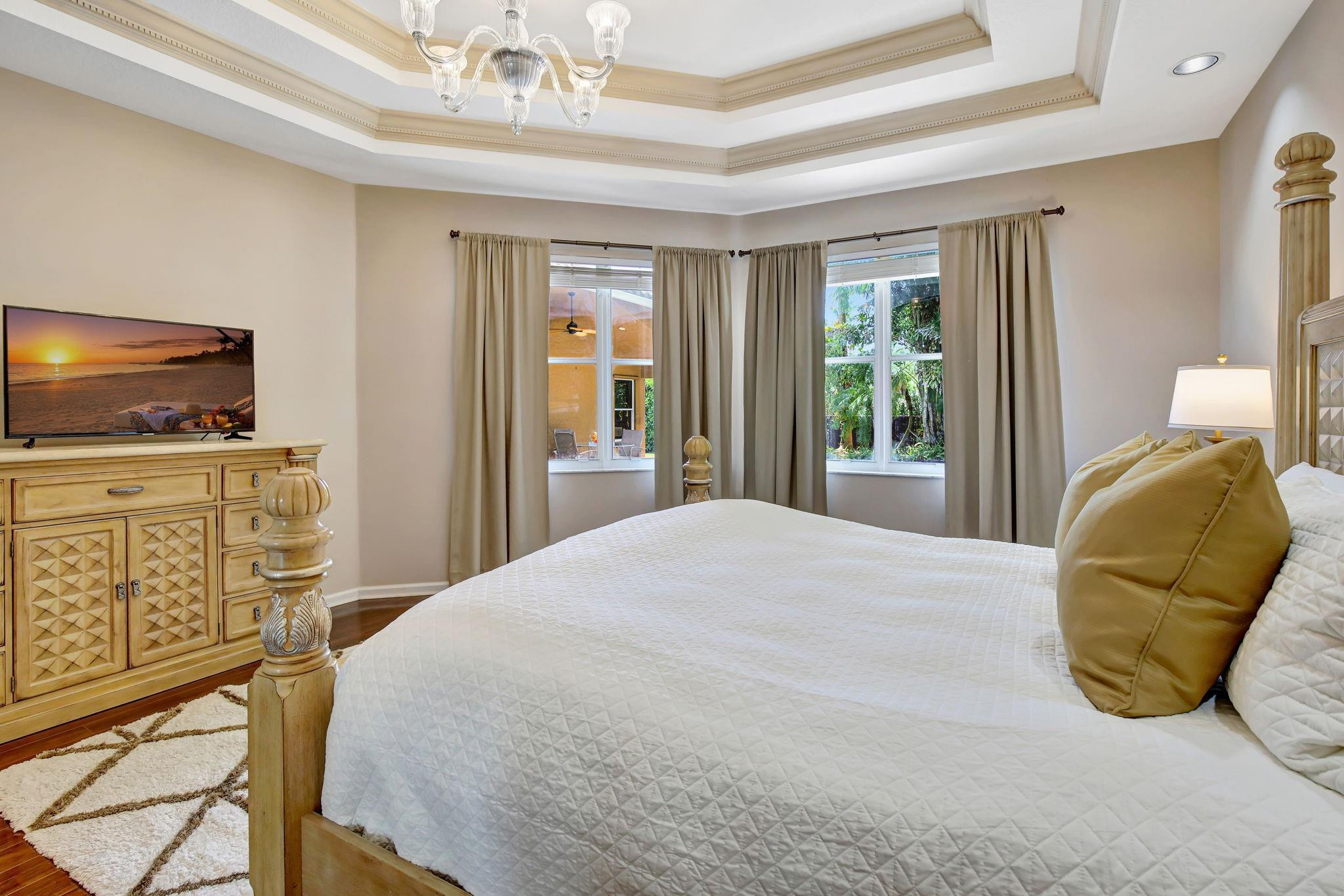 2529 Eagle Run Circle Fort Lauderdale, FL 33327 - Photo 41 of 74 a bedroom with a bed and flat screen tv