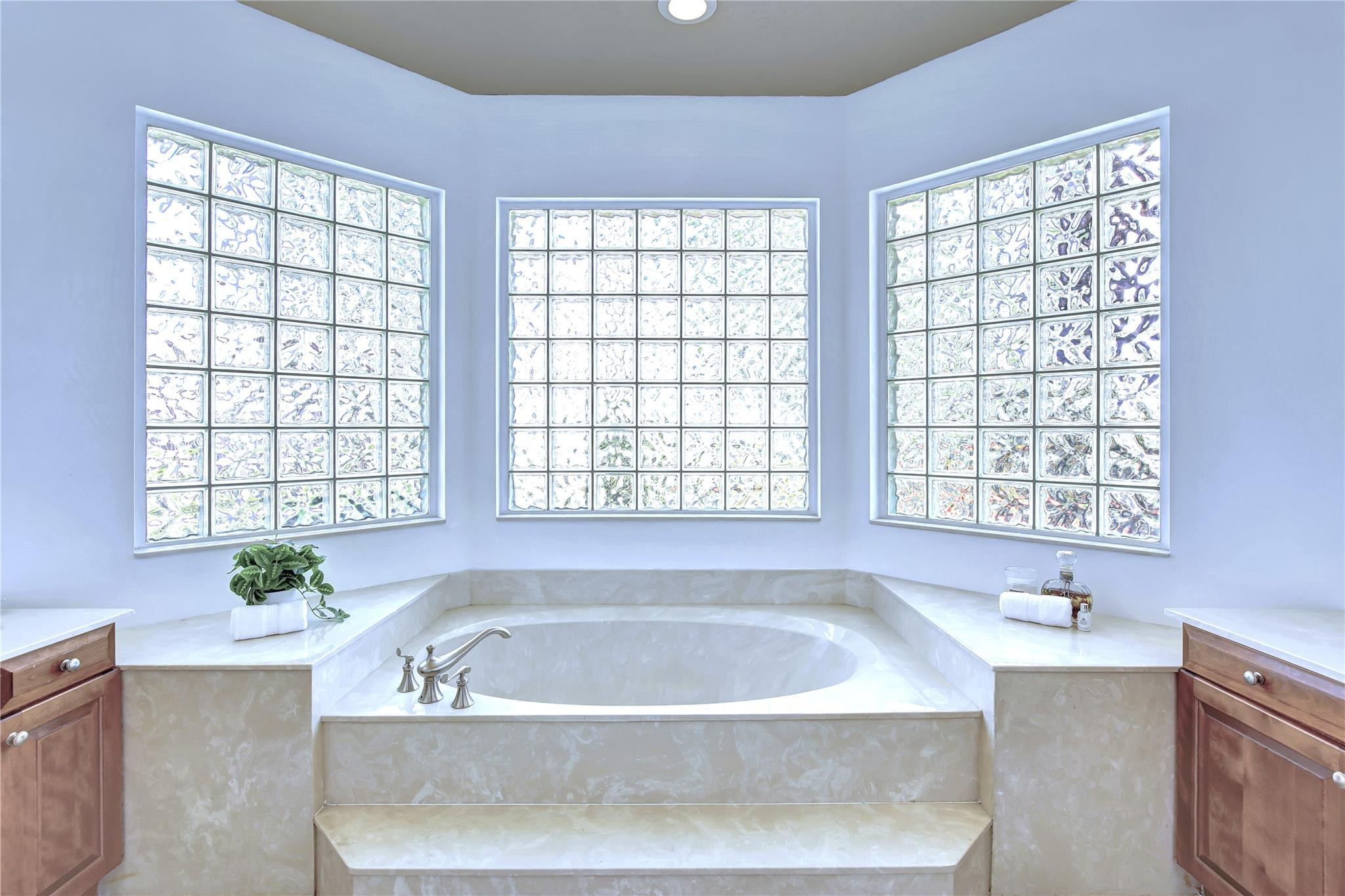 2529 Eagle Run Circle Fort Lauderdale, FL 33327 - Photo 44 of 74 a bath tub sitting in a bathroom next to a window