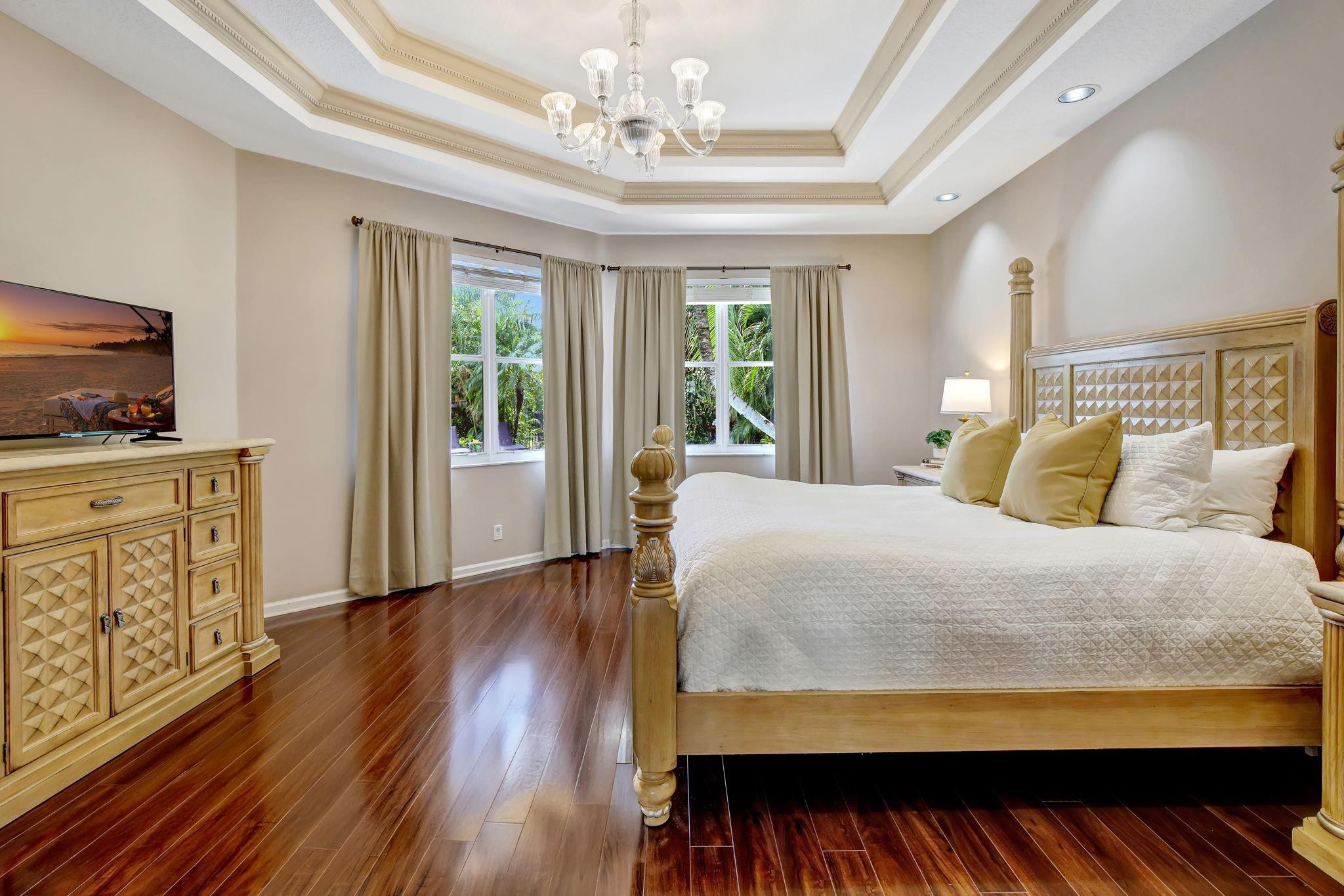 2529 Eagle Run Circle Fort Lauderdale, FL 33327 - Photo 47 of 74 a bed sitting in a spacious bedroom next to a window