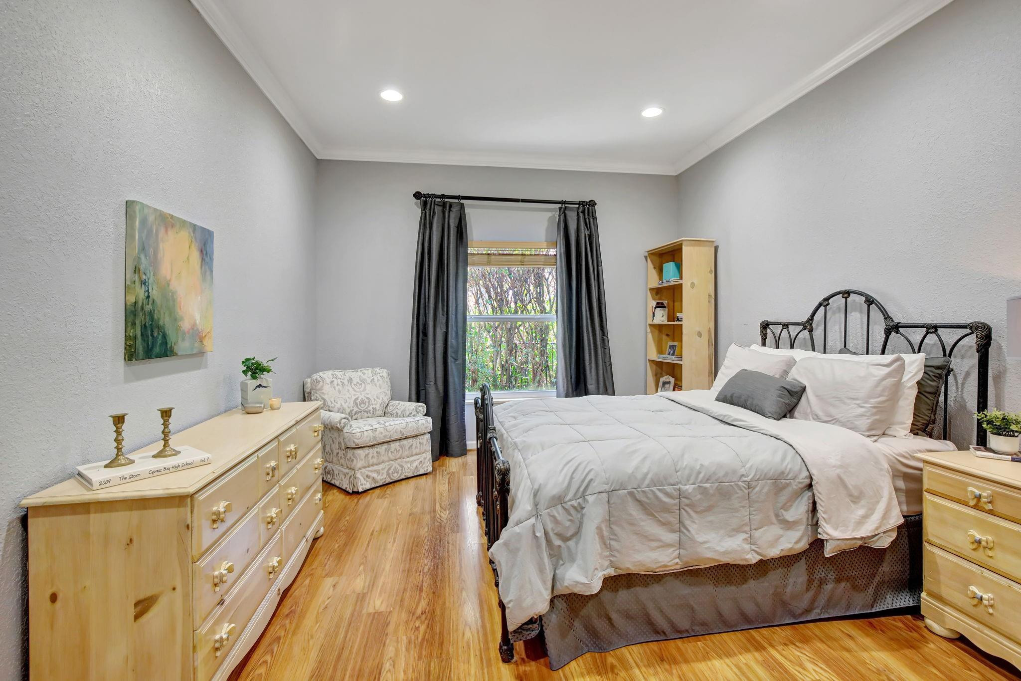 2529 Eagle Run Circle Fort Lauderdale, FL 33327 - Photo 52 of 74 a bedroom with a bed and a large window