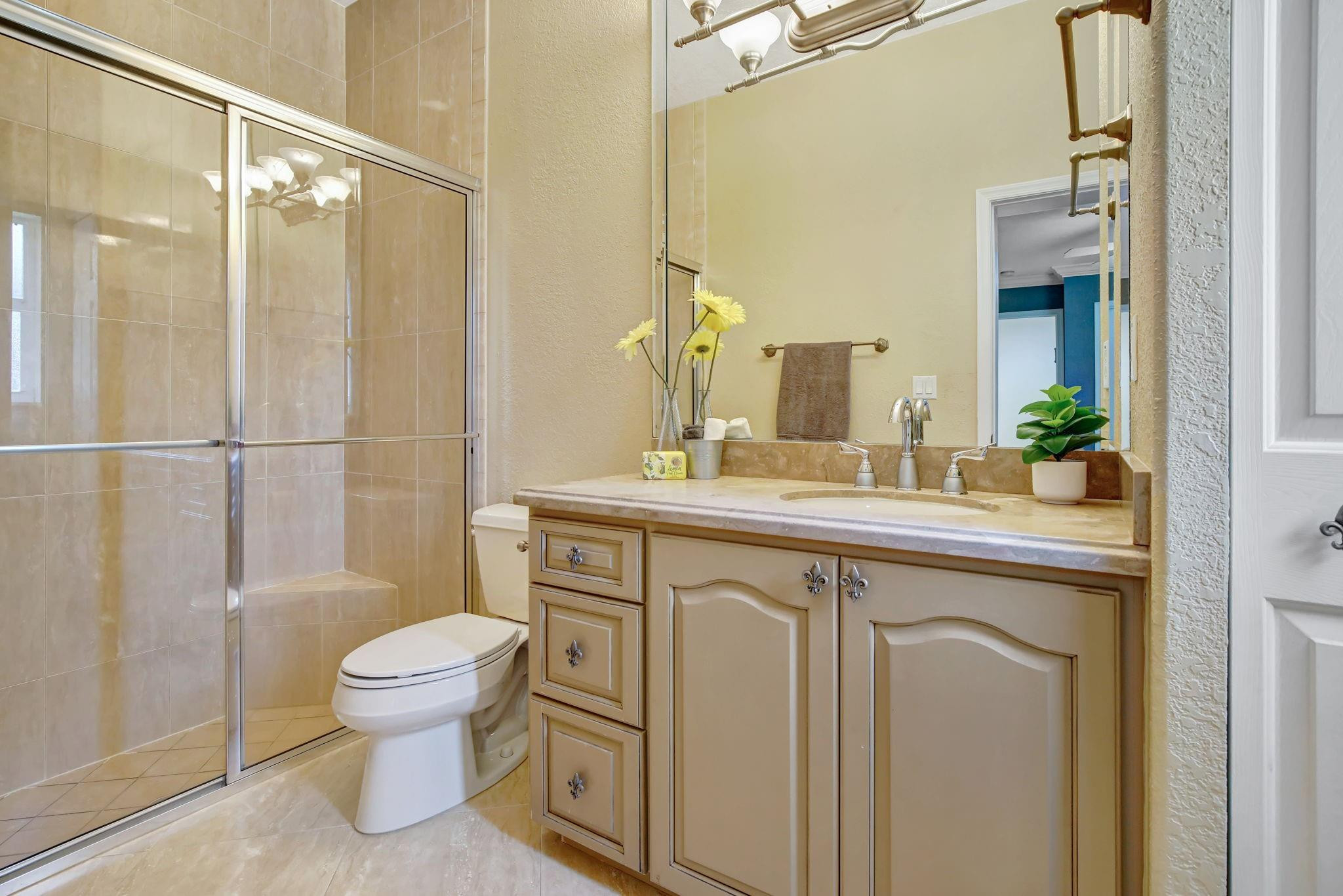 2529 Eagle Run Circle Fort Lauderdale, FL 33327 - Photo 56 of 74 a bathroom with a sink a toilet and shower