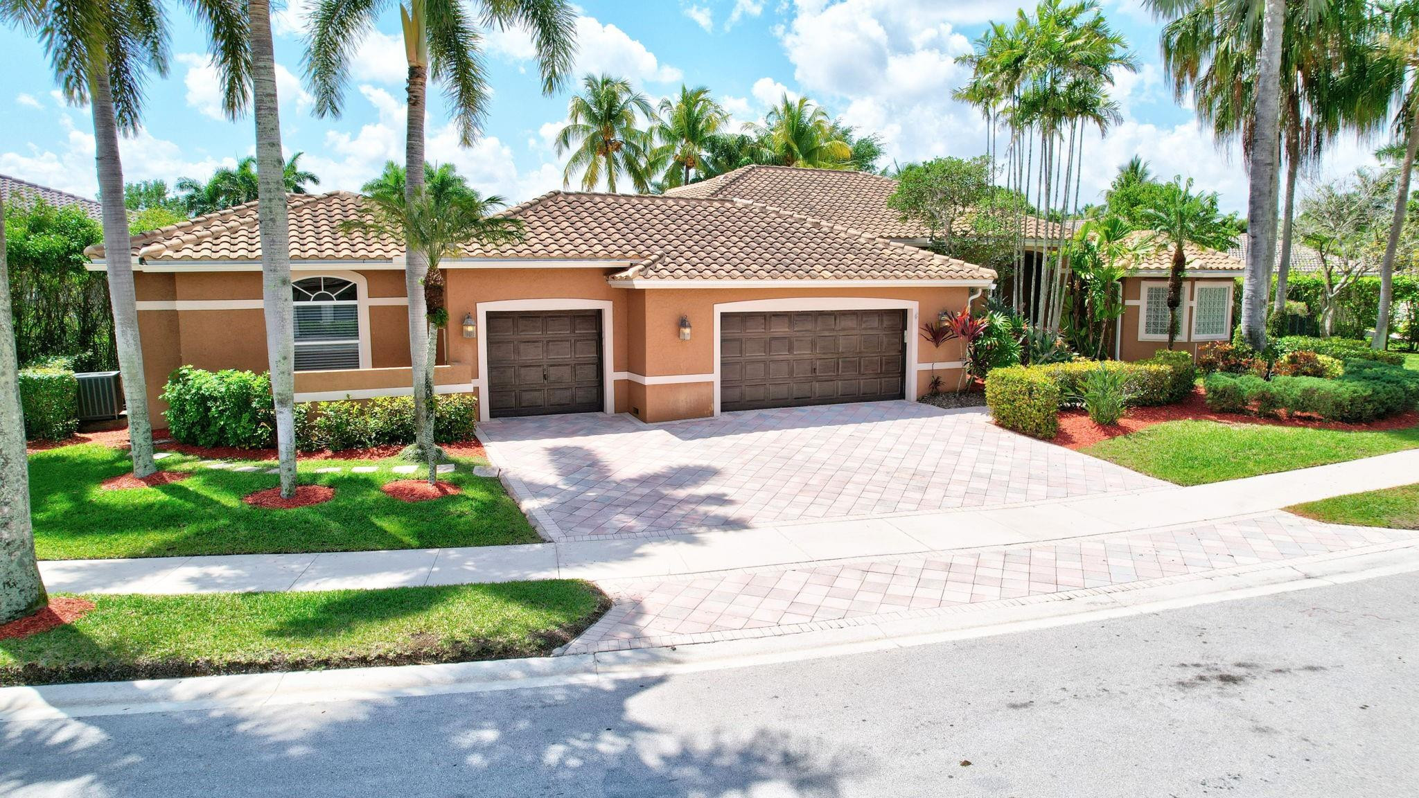 2529 Eagle Run Circle Fort Lauderdale, FL 33327 - Photo 67 of 74 a front view of house with yard and green space