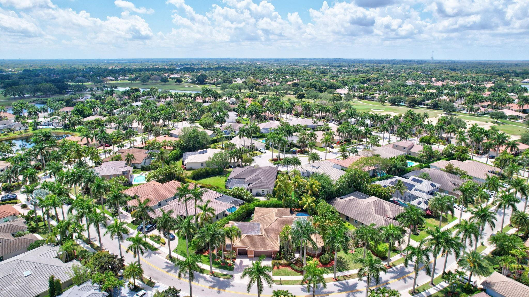 2529 Eagle Run Circle Fort Lauderdale, FL 33327 - Photo 69 of 74 an aerial view of residential houses with outdoor space and trees