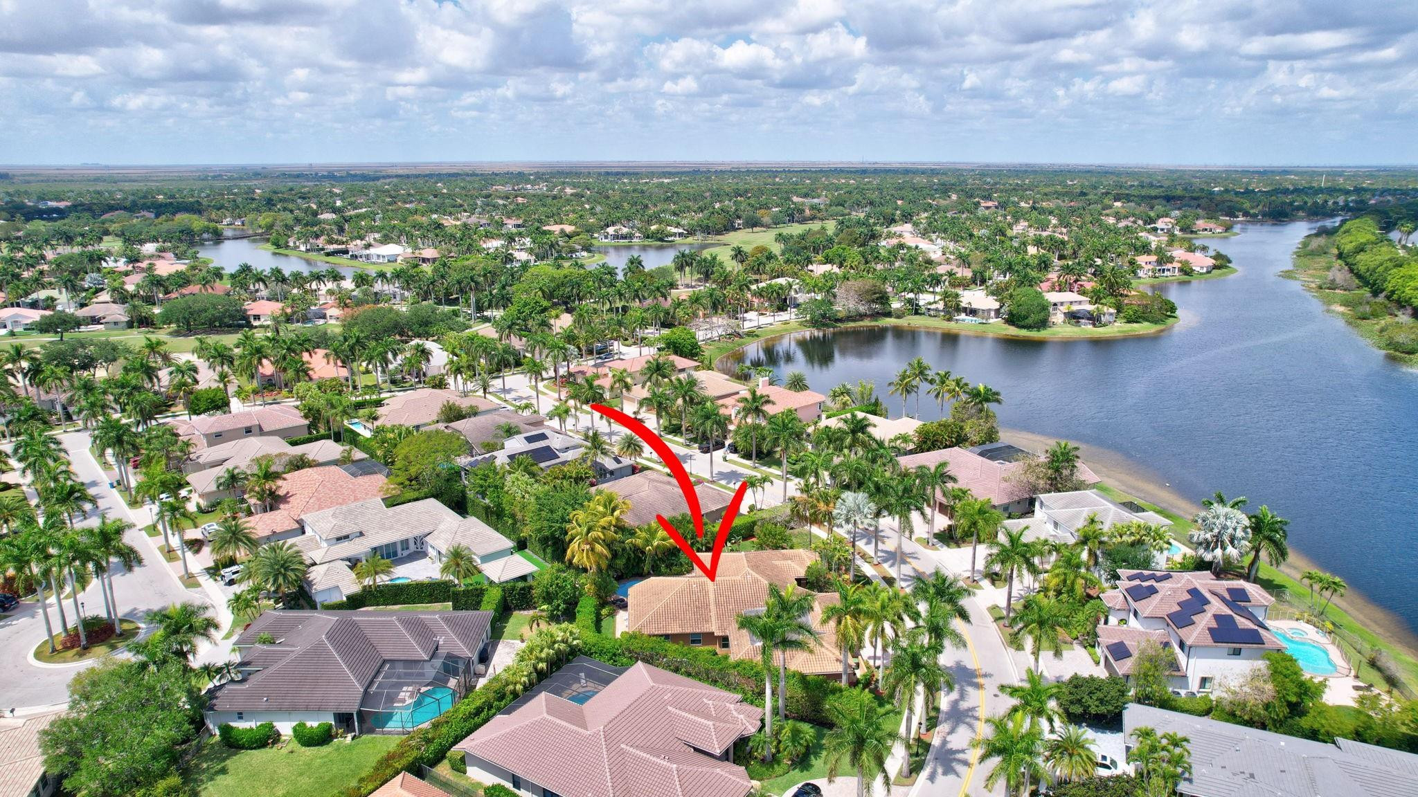 2529 Eagle Run Circle Fort Lauderdale, FL 33327 - Photo 70 of 74 an aerial view of residential houses with outdoor space and lakeside