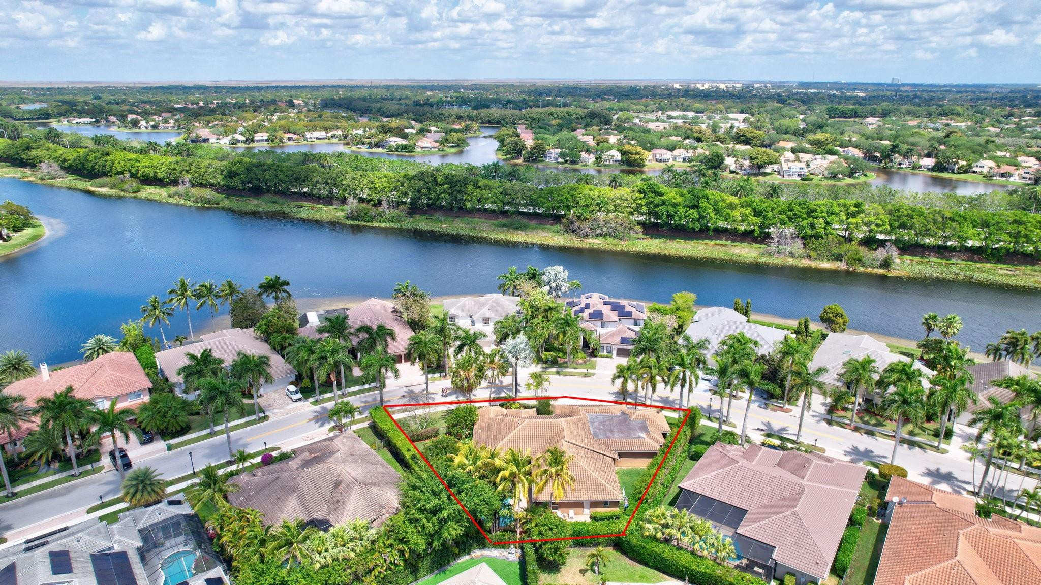 2529 Eagle Run Circle Fort Lauderdale, FL 33327 - Photo 8 of 74 an aerial view of a house with a lake view