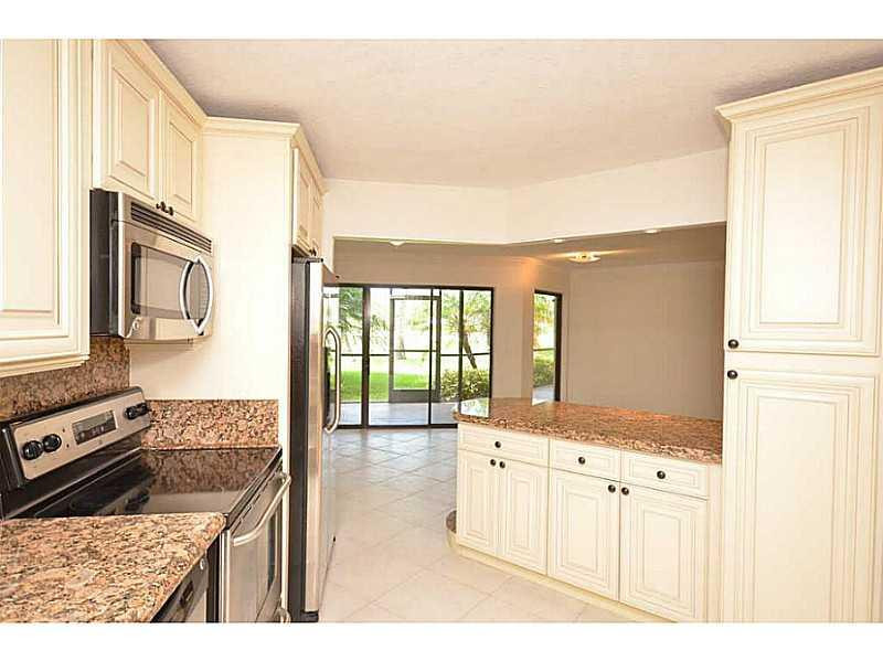 5901 Camino Del Sol, Unit 107 Boca Raton, FL 33433 - Photo 1 of 28 Exterior Front