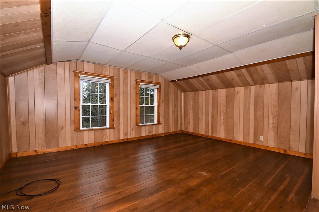 5652 Winchell Road Hiram, OH 44234 - Photo 15 of 25 Large bedroom on second floor with wood flooring.
